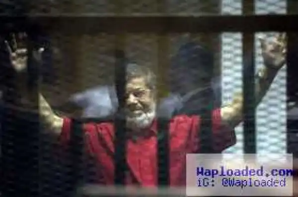 Egyptian court sentences former President Morsi to life in prison and 2 Aljazeera journalists, female reporter, to death